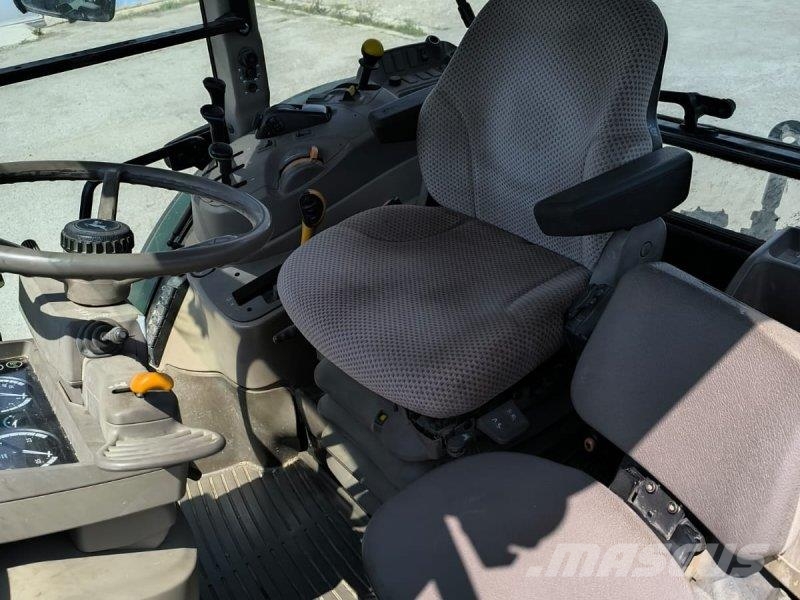 John Deere 6100MC Трактори