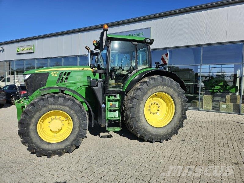 John Deere 6215R Трактори