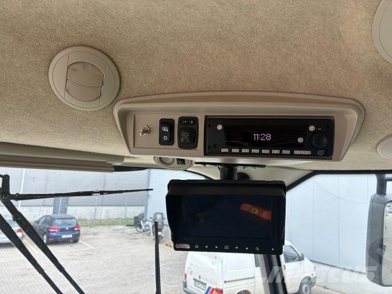 John Deere T 560 i Kombajni