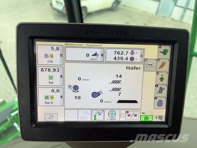 John Deere T 560 i Kombajni
