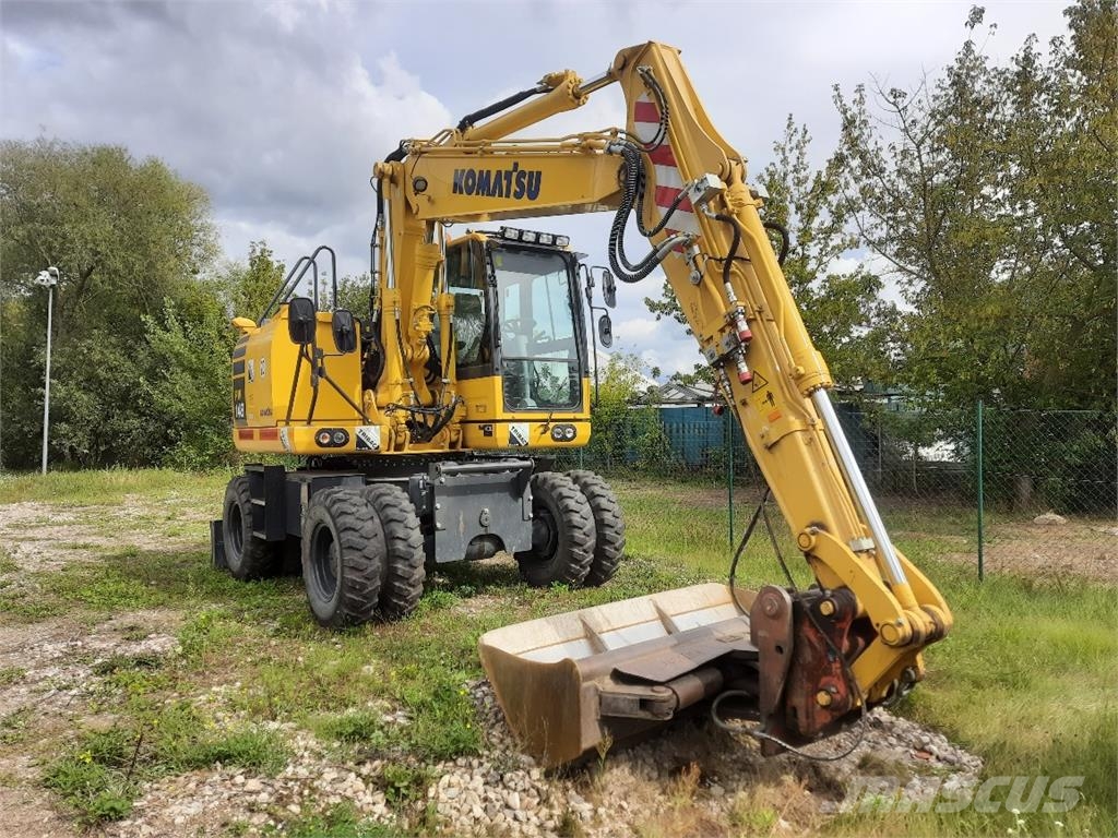 Komatsu PW148-10 حفارات بعجل