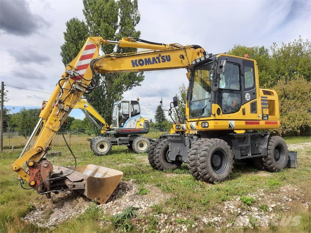 Komatsu PW148-10 حفارات بعجل