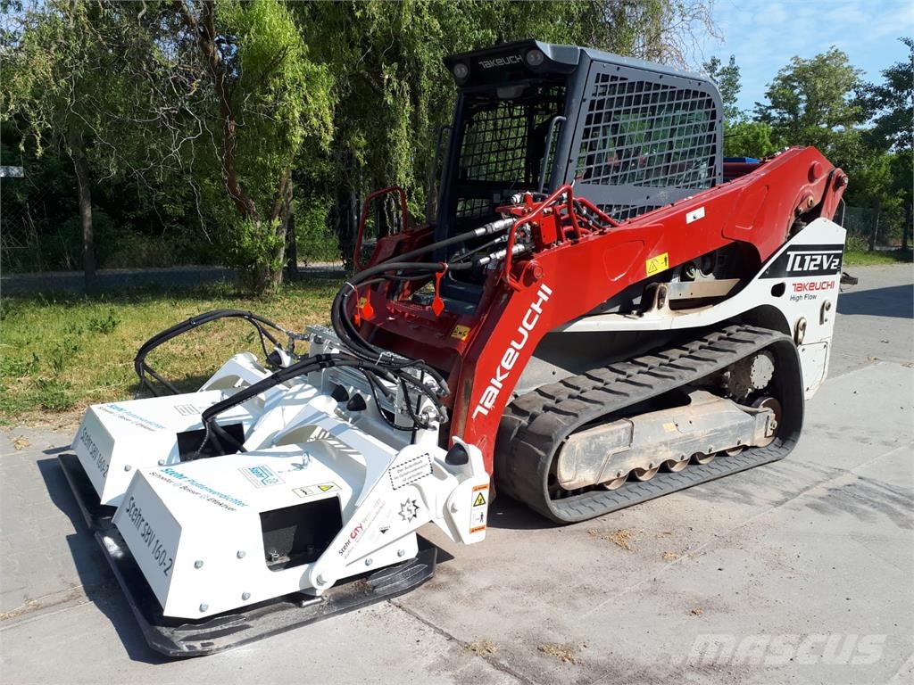 Takeuchi TL12V2 لوادر زحافة