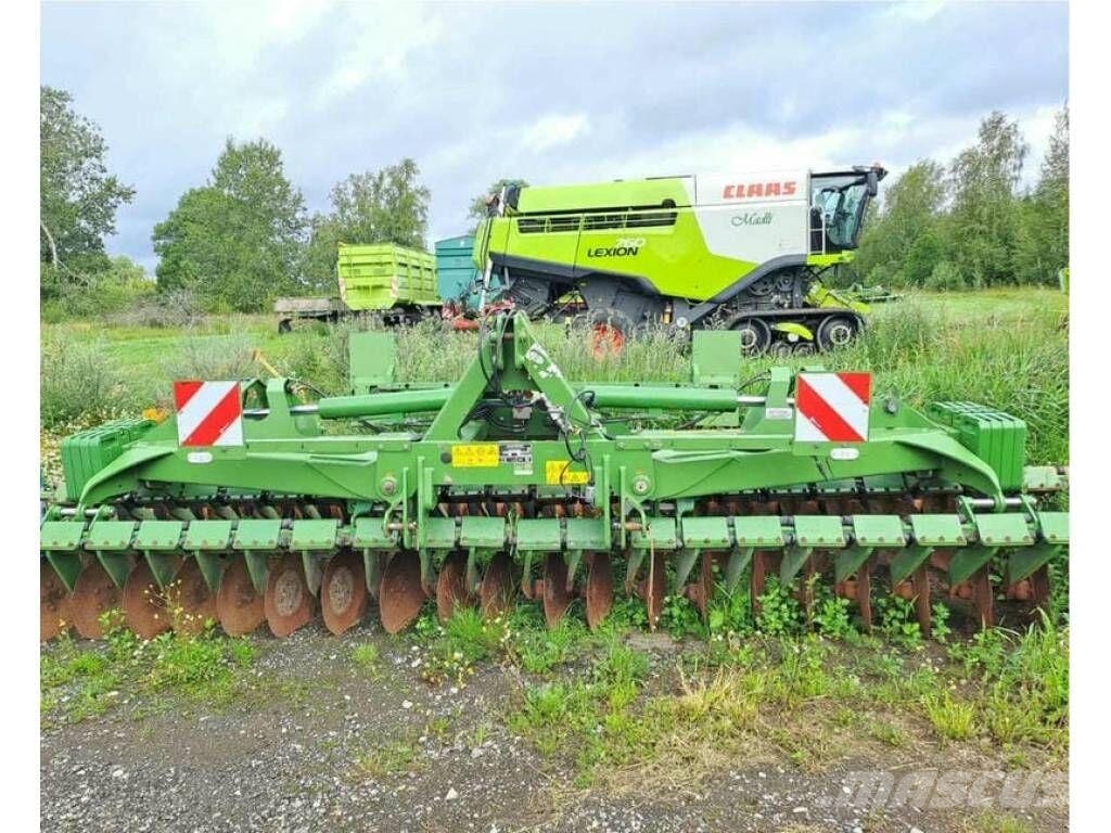Amazone Catros + 6002-2 Schijveneggen