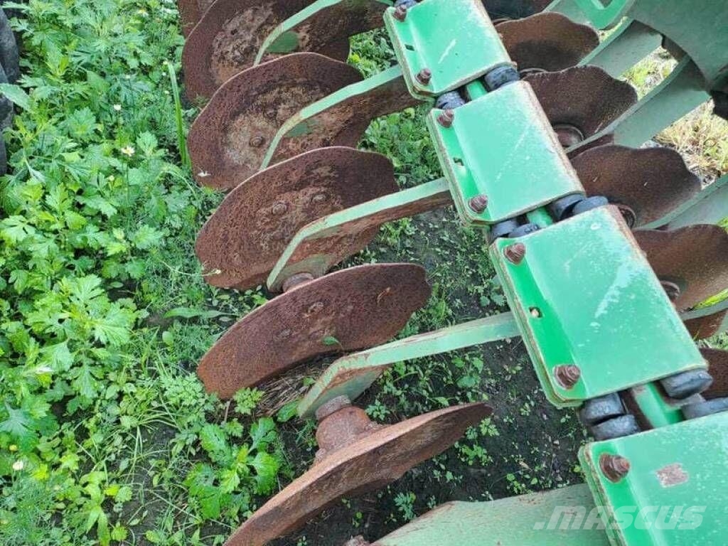 Amazone Catros + 6002-2 Schijveneggen