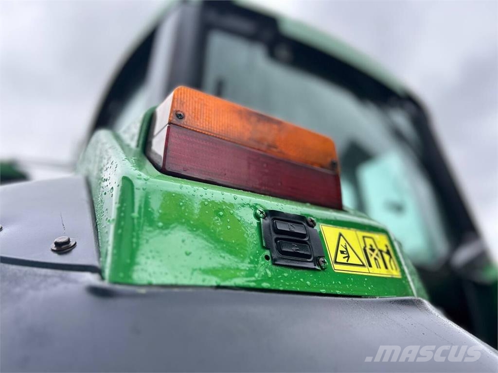 John Deere Трактор John Deere 6910 (1997) Tractores