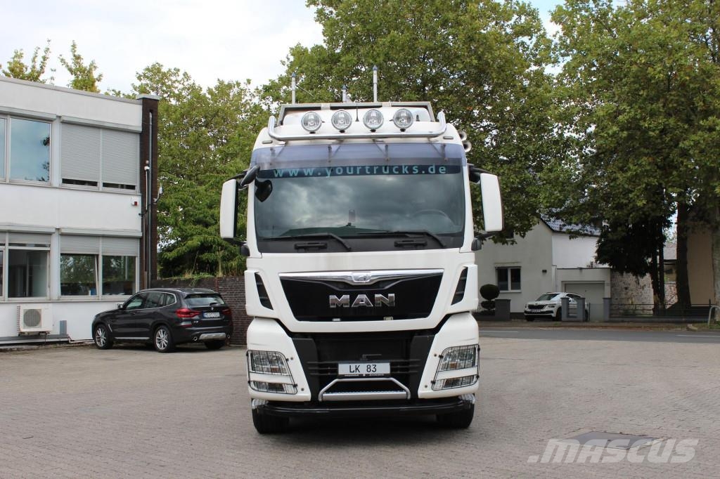 MAN TGX 33.560 D38Motor 6x4 Intarder KESLA-Holzkran Camion pentru lemne