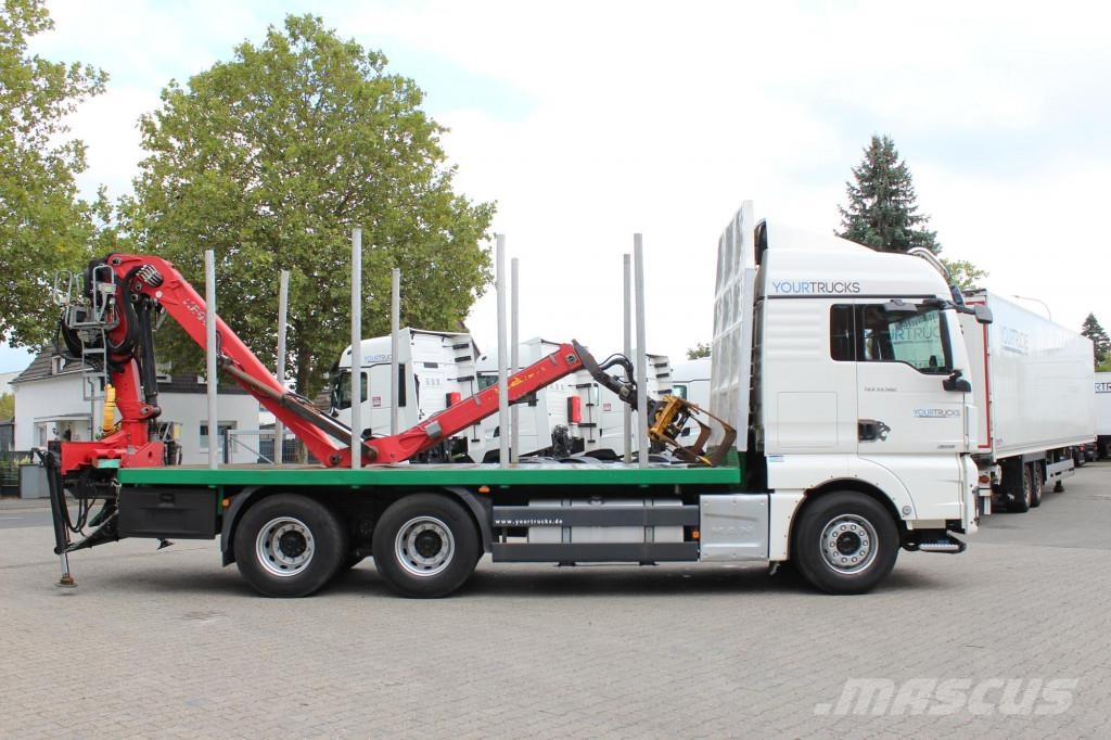 MAN TGX 33.560 D38Motor 6x4 Intarder KESLA-Holzkran Camion pentru lemne