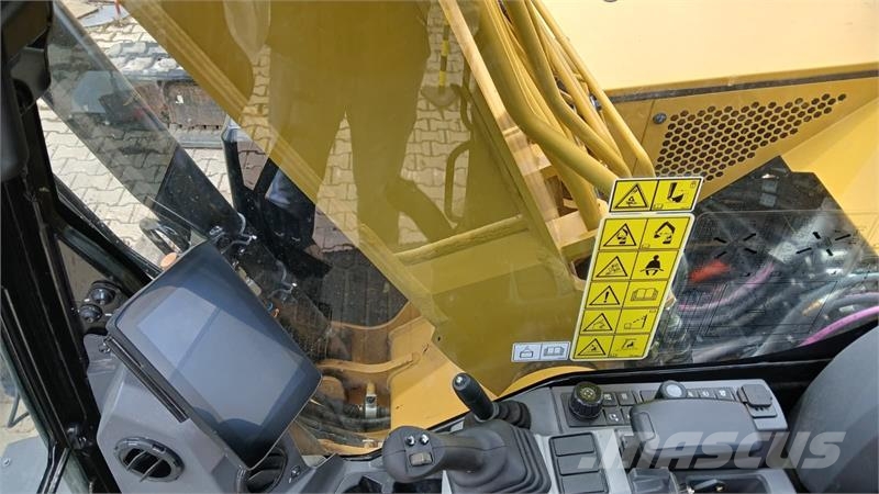CAT 310 Pásové rýpadlá