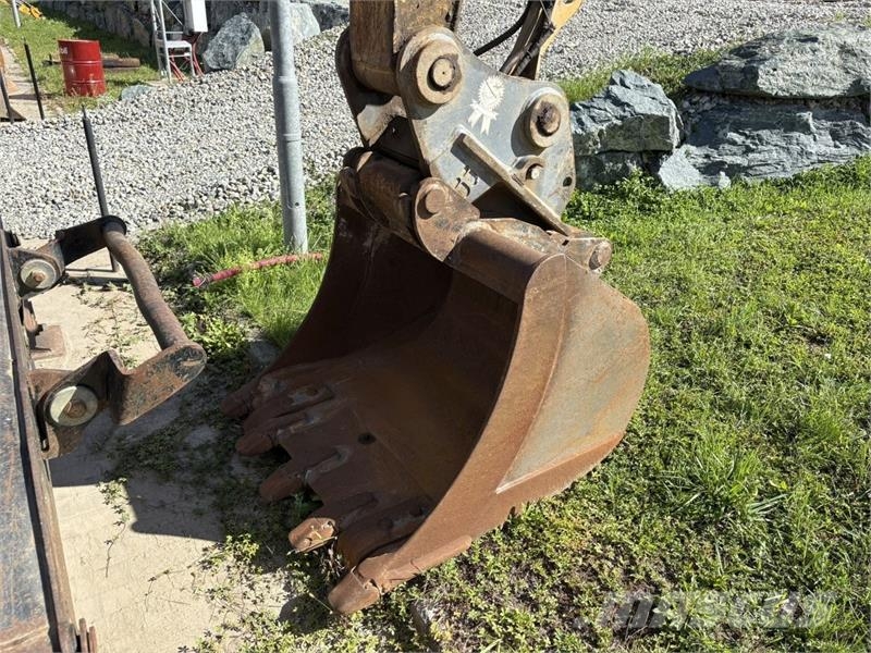 CAT M316D حفارات بعجل